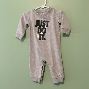 Practically brand new- Nike onesie 6m